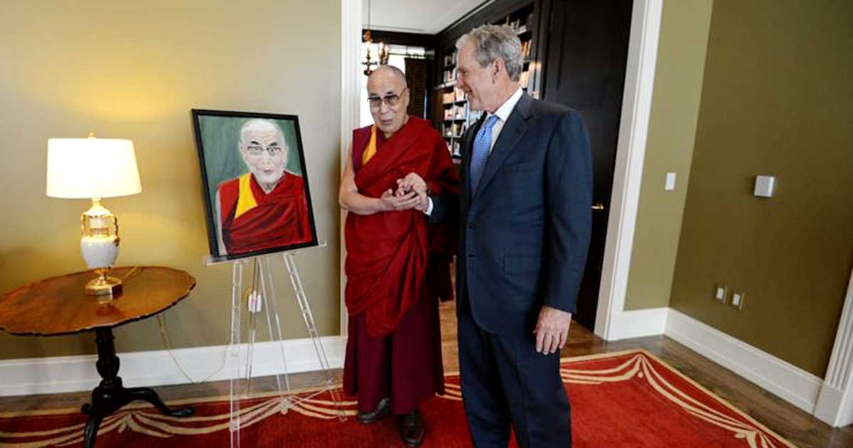 Dalai Lama stands next to President George W. Bush
