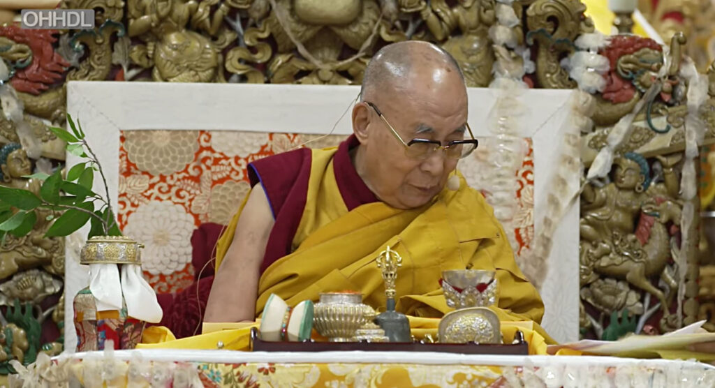 Dalai Lama reading 